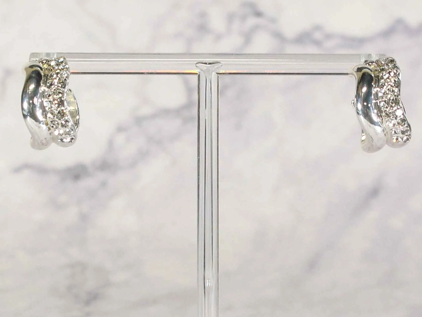 2395 Silver Crossover Crystal Huggie Earrings – Sleek Everyday Glam