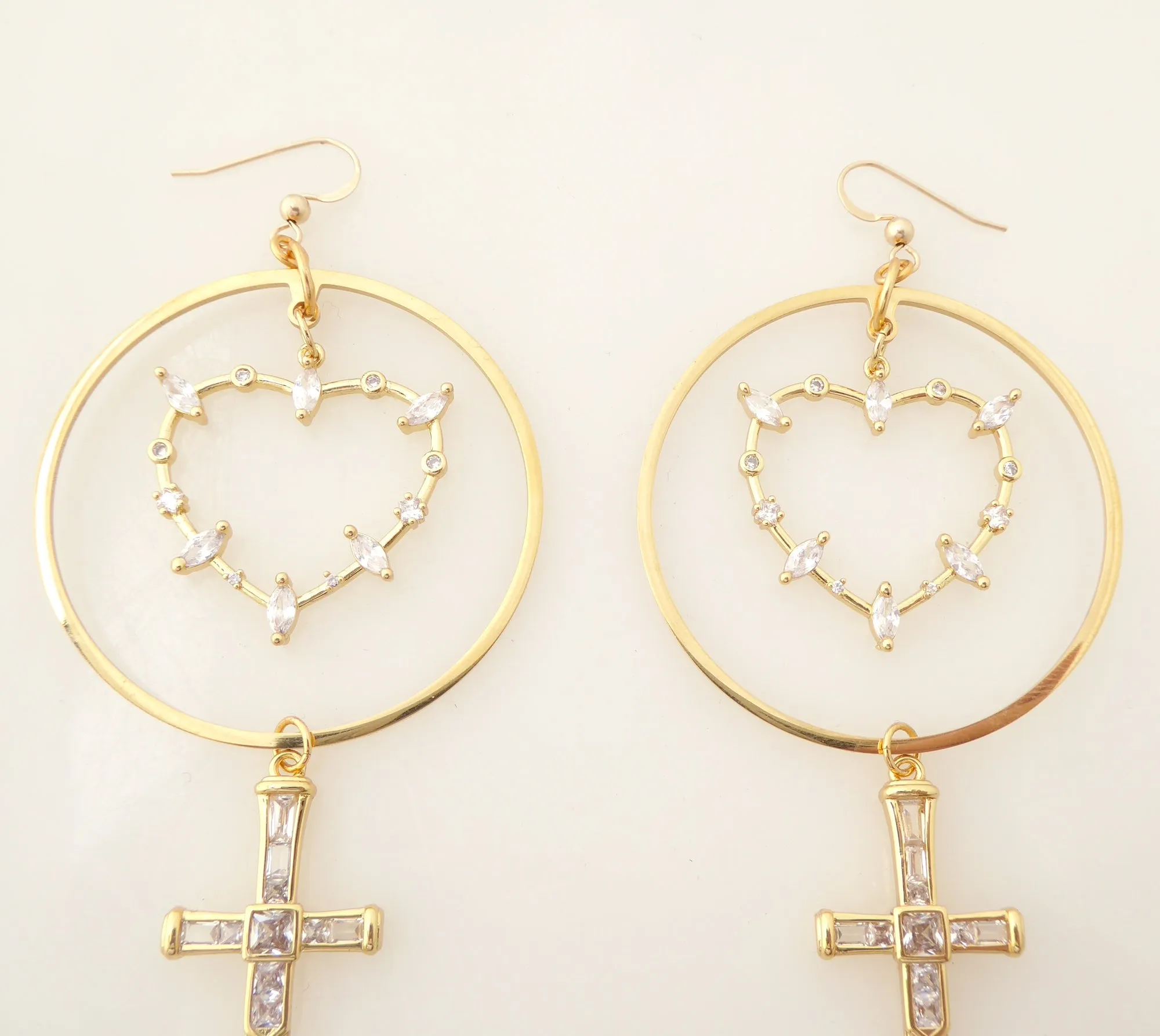 Gold rhinestone heart and dagger earrings