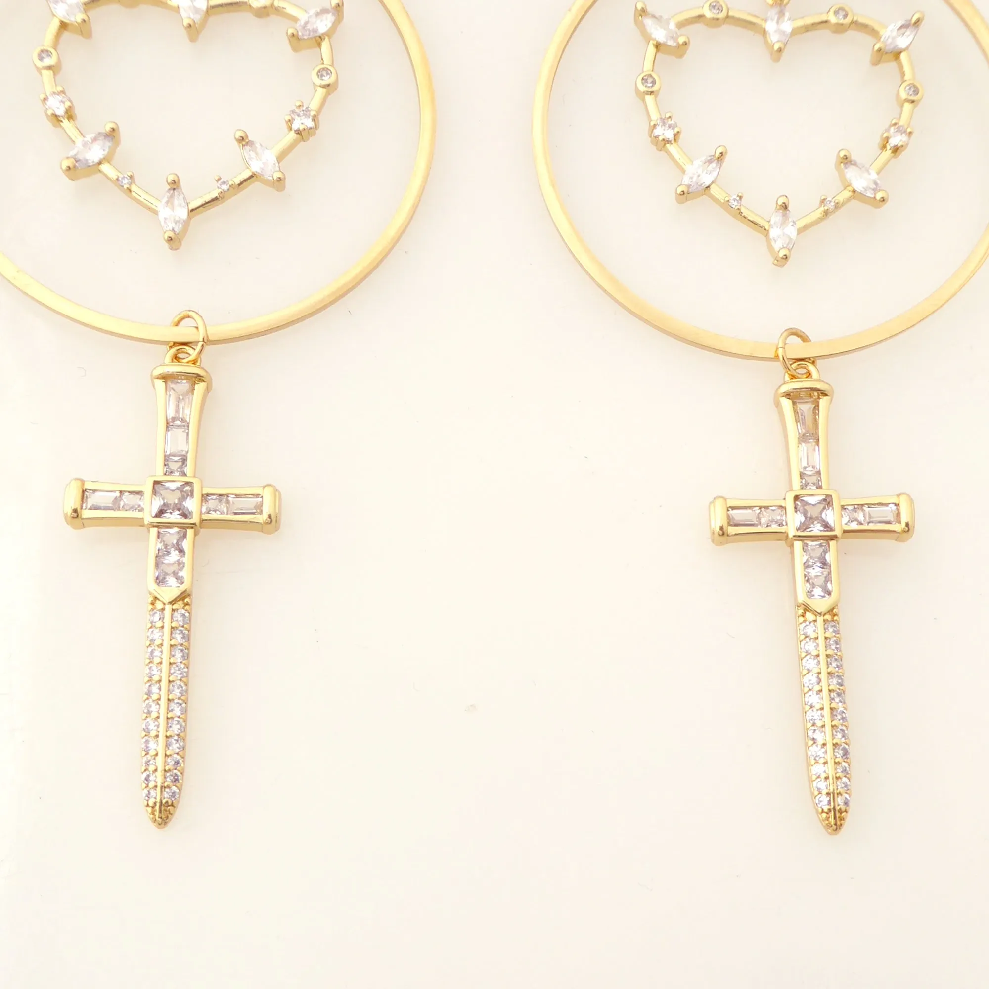 Gold rhinestone heart and dagger earrings