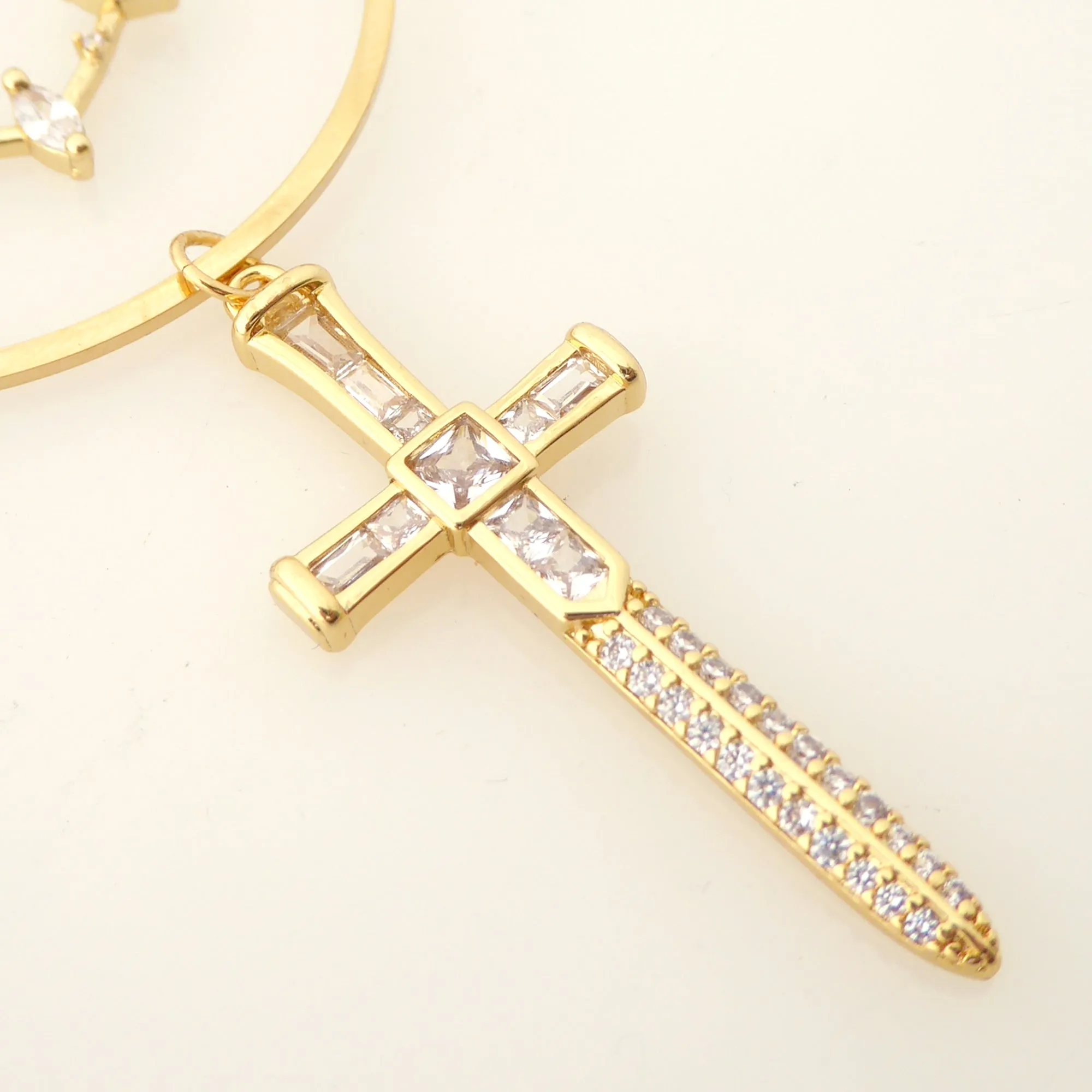 Gold rhinestone heart and dagger earrings