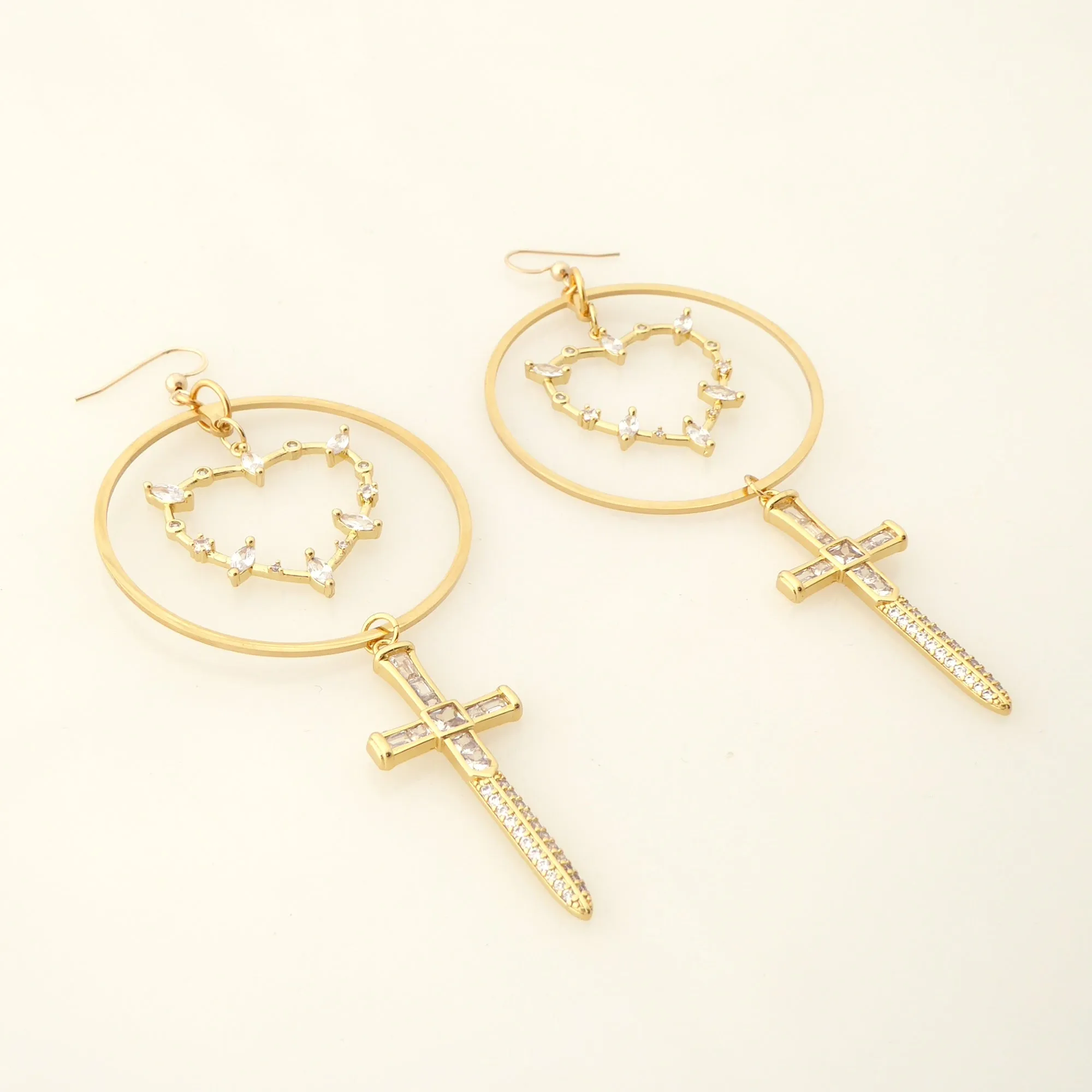Gold rhinestone heart and dagger earrings