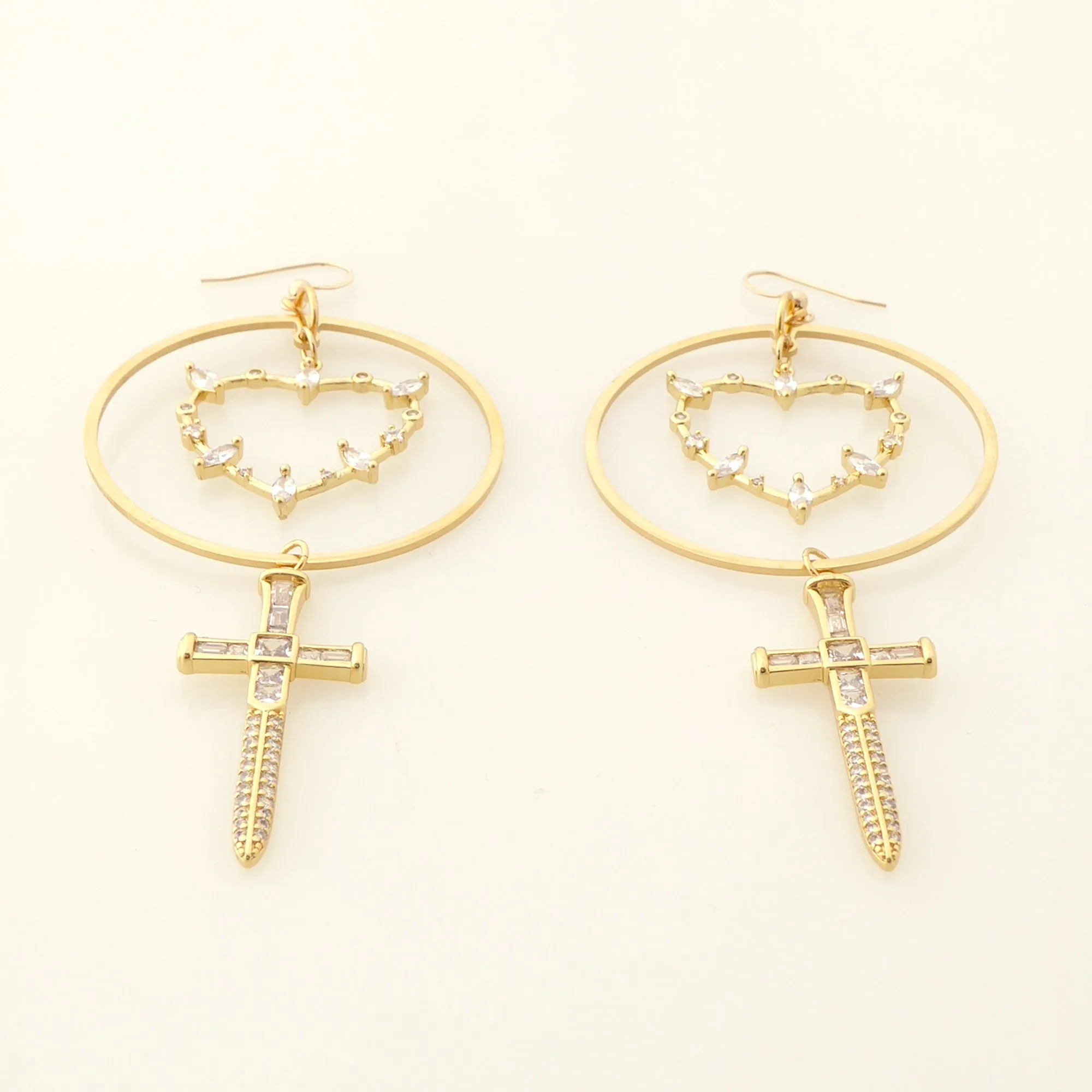 Gold rhinestone heart and dagger earrings
