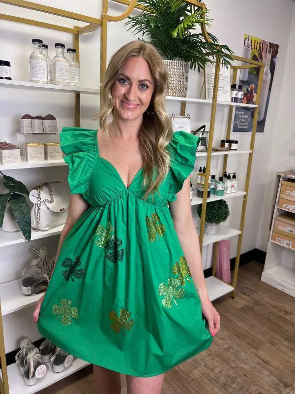 Lily Mae Green Dress with Ruffled Shoulders and Rhinestone Clovers